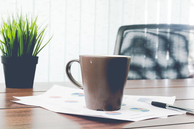 Close-up of coffee cup on table