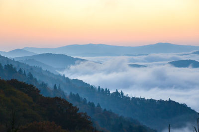 Scenic view of mountains against sky during sunset