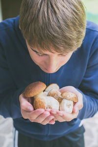 Midsection of boy holding ice cream