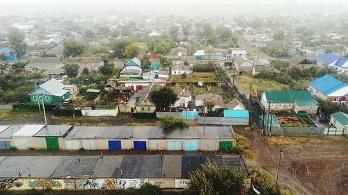 Scenic view of residential district against sky