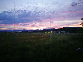 Scenic view of landscape against cloudy sky