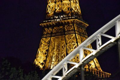 Low angle view of illuminated lit up at night