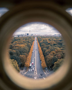 Panoramic view of road in city against sky