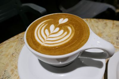 High angle view of cappuccino on table