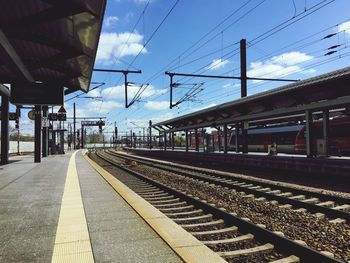 Railroad tracks on railroad station platform