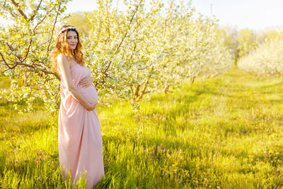 Woman standing on field