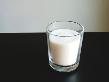 Close-up of beer glass on table
