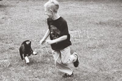 Full length of dog on field