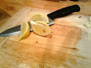 High angle view of fruits on cutting board