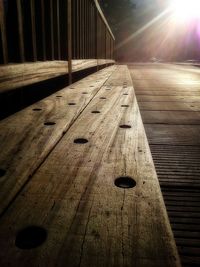 Sun shining through wooden wall