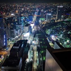 High angle view of illuminated city at night