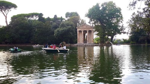 People on boat in lake