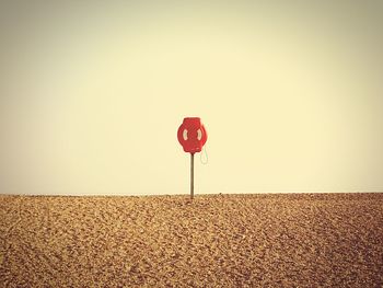 Low angle view of red wall