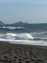 Scenic view of sea against clear sky