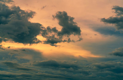 Low angle view of clouds in sky during sunset