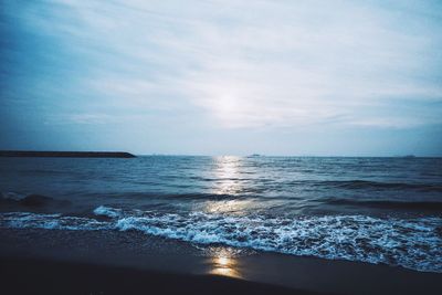 Scenic view of sea at sunset