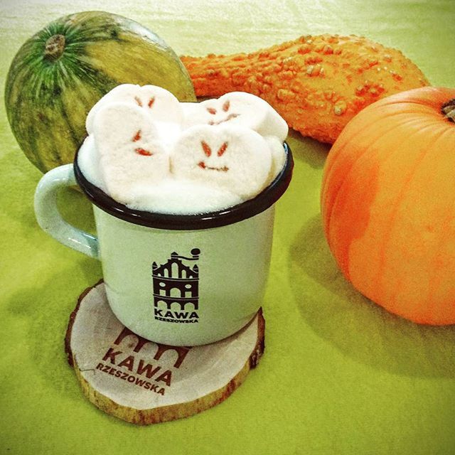 indoors, table, still life, high angle view, close-up, text, food and drink, no people, animal representation, art, art and craft, creativity, western script, food, day, pumpkin, toy, human representation, container, freshness