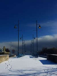 View of street light against blue sky