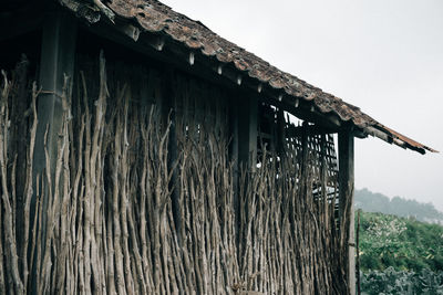 Low angle view of roof against sky