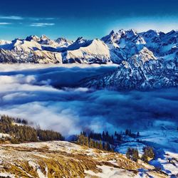 Scenic view of snow covered mountains