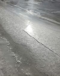 High angle view of frozen water