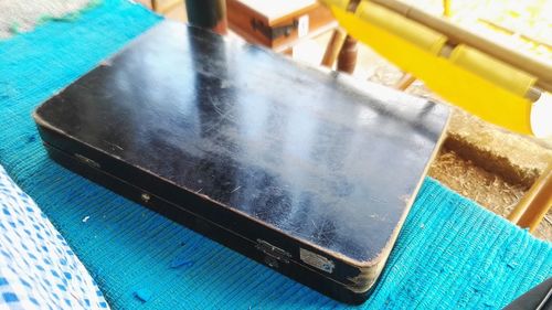 High angle view of mobile phone on table