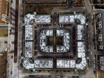 Aerial view of buildings in city during winter