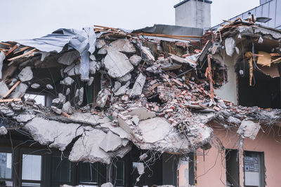 Low angle view of garbage on building