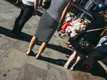 Low section of people walking outdoors