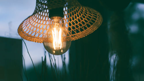 Close-up of illuminated light bulb