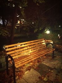 Image of empty seats in park at night