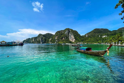 High angle view of boat in sea against sky