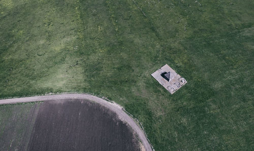 High angle view of concrete wall by plants