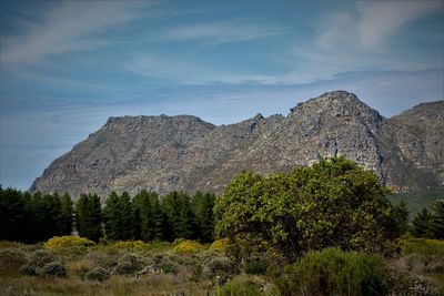 Scenic view of rocky mountains against sky