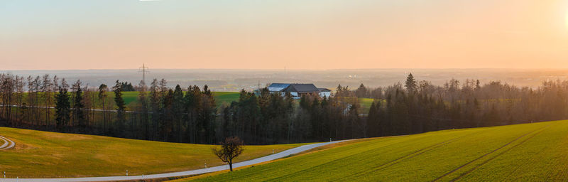 Scenic view of landscape against sky during sunset