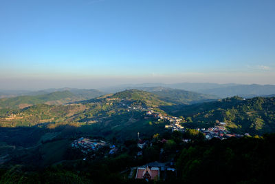 Aerial view of townscape against clear sky