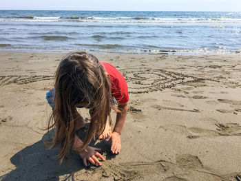 Full length of  child on beach