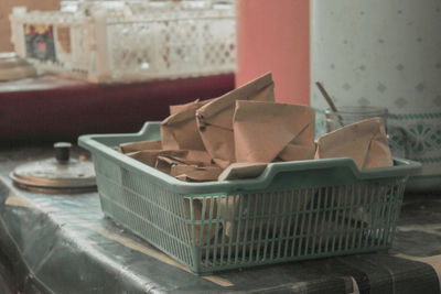 Close-up of wicker basket on table