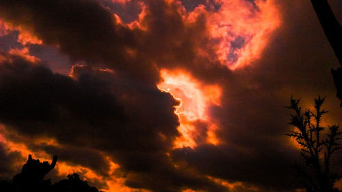 Low angle view of cloudy sky during sunset