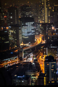 High angle view of illuminated buildings at night