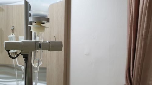 Close-up of iv drip in hospital