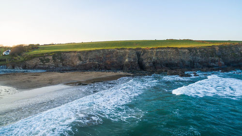 Scenic view of sea against clear sky