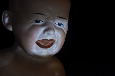 Close-up portrait of shirtless boy