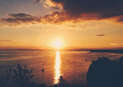 Scenic view of sea at sunset