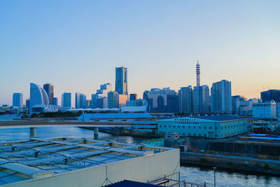 Cityscape against clear sky