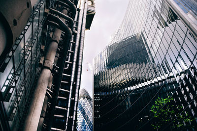 Low angle view of city buildings against sky