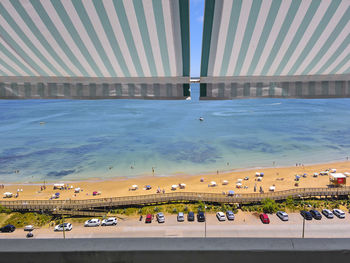 High angle view of people at swimming pool in city