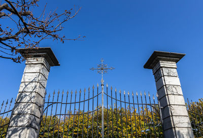 Low angle view of historical building against blue sky