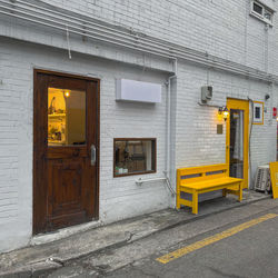 View of yellow entrance of abandoned building