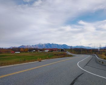 Experimental farms of university of alaska at mat su valley in front of chugach mountain range